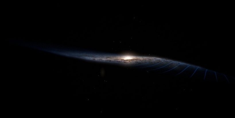 Млечный путь искривлен, и это наследие от продолжающегося галактического столкновения