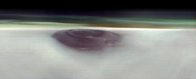 The new panorama from the Odyssey orbiter captured clouds, a volcanic peak, and the layering of Mars’s atmosphere. Спутниковые спутники НАСА