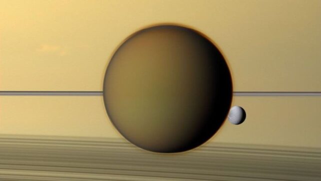 Titan passed before Saturn and its rings. В конце концов Титан, возможно, не является «миром-океаном» — правда страннее